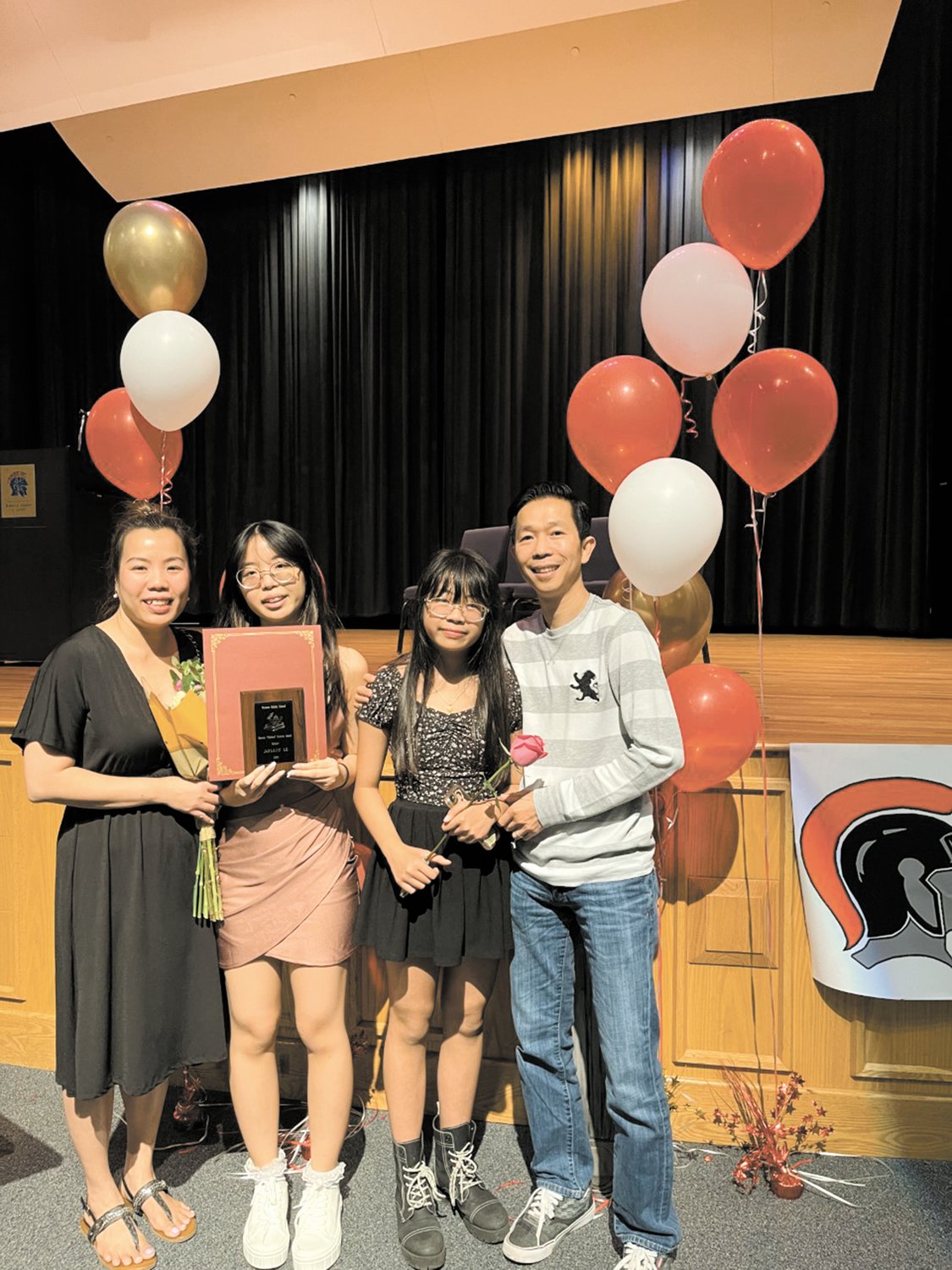 GUEST SPEAKER: Winman 8th grader Jaylene Le was the guest speaker during the National Junior Honor Society night. from left to right is Jaylene’s mom Ashley, Jaylene, Joanna and her dad Justin.